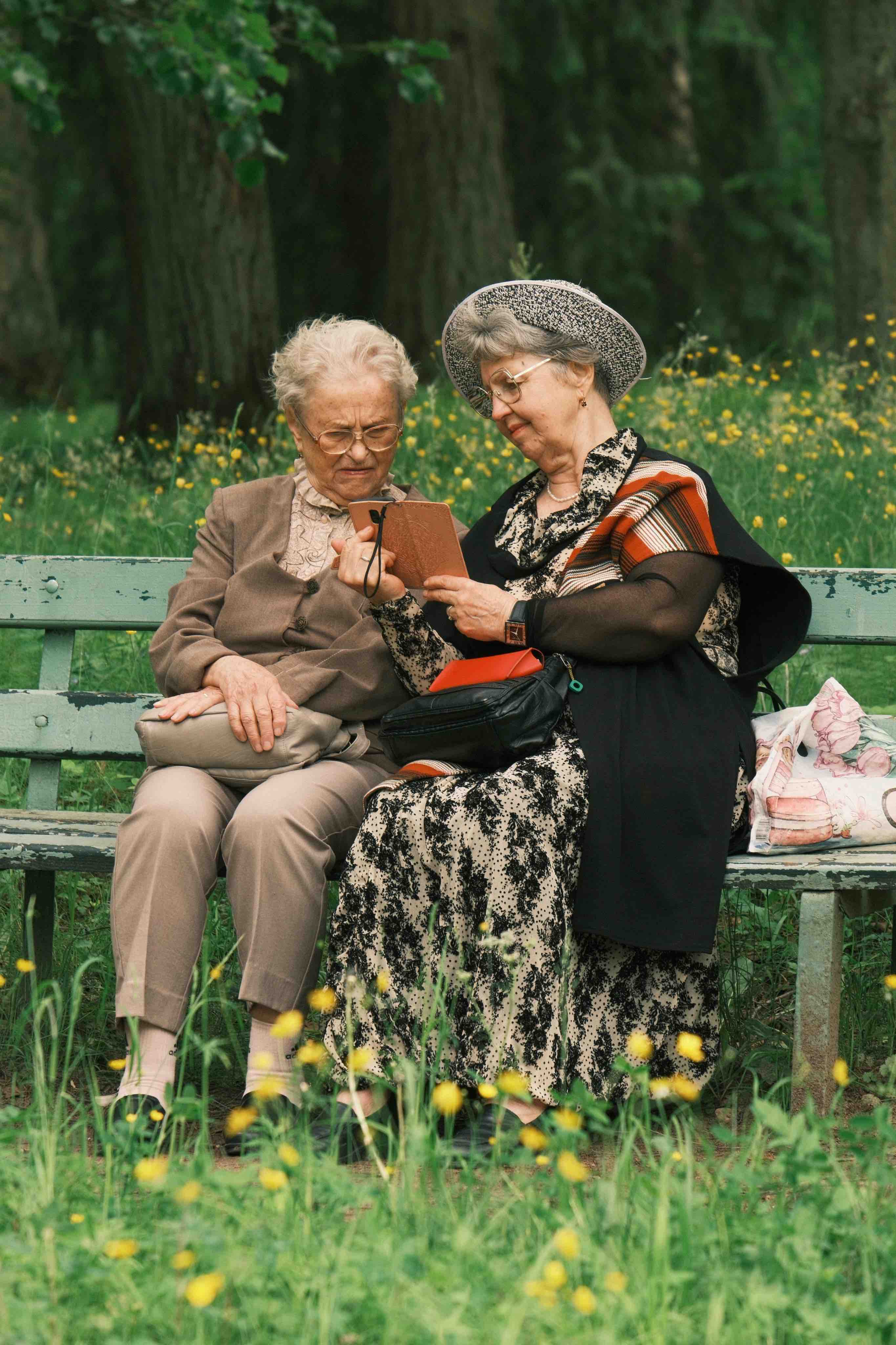 Older adult with a family member outdoors